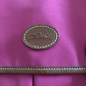 Longchamp Le Pliage crossbody messenger bag.